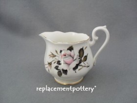 Queen's Messenger Milk Jug